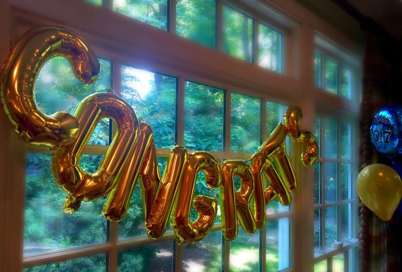 golden-balloons-with-the-word-congrats-at-a-graduation-party-.jpg